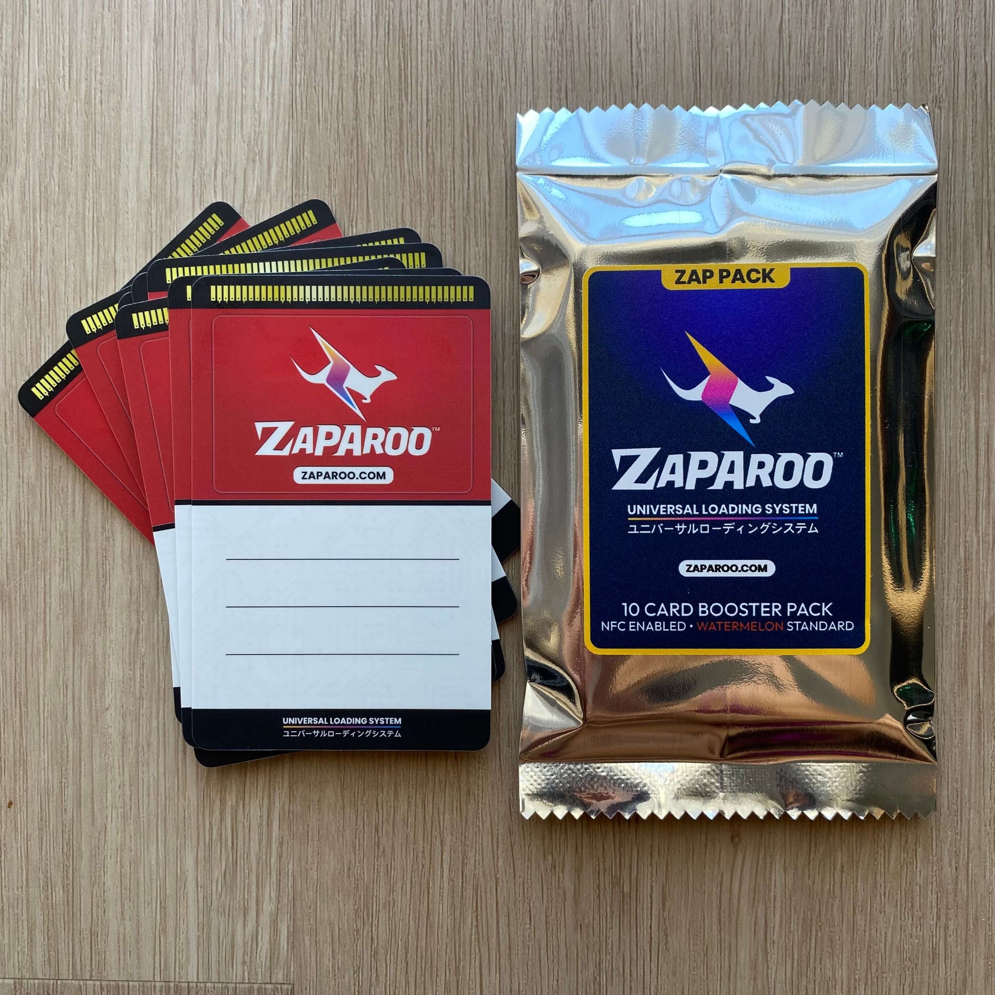 Stack of Zaparoo Funtastic Watermelon cards alongside booster foil pack