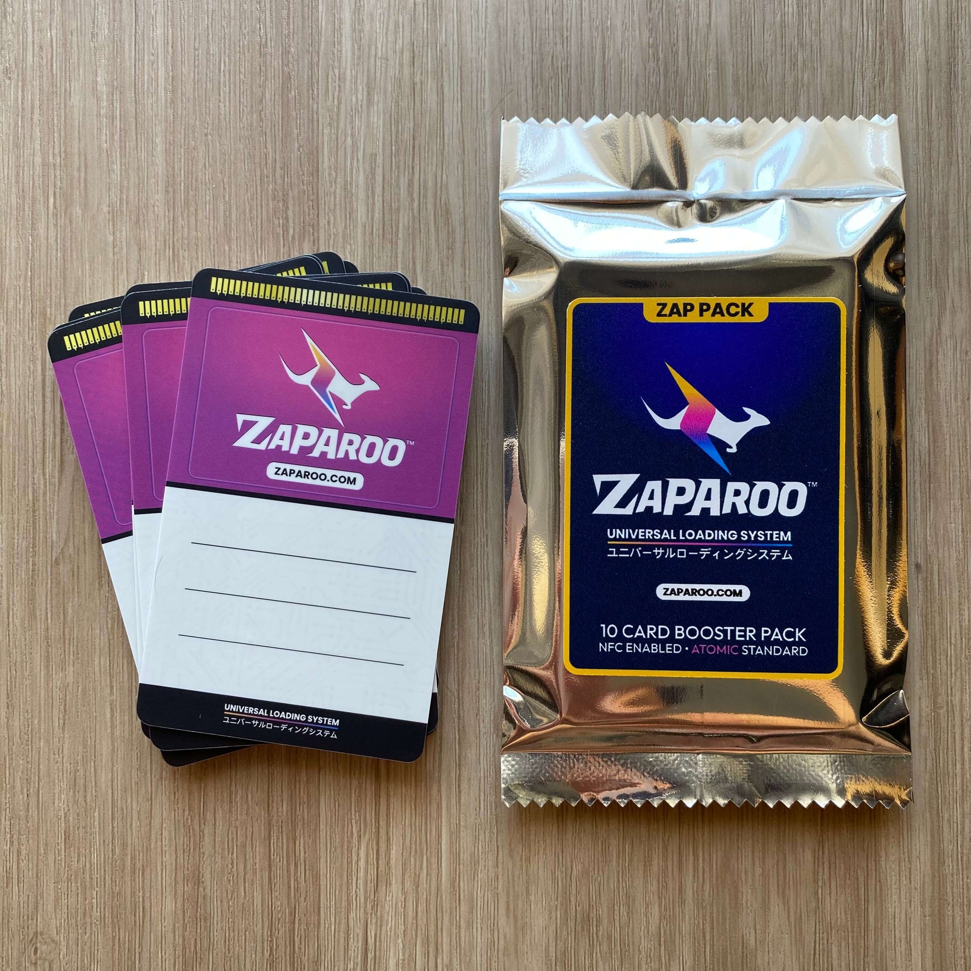 Zaparoo cards and booster pack on a wooden surface