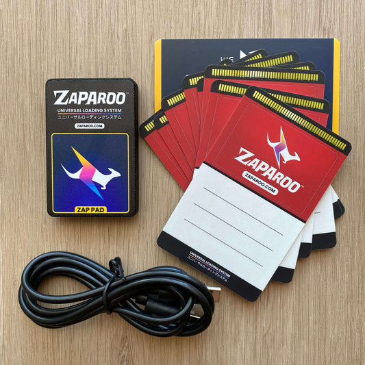 Black Zap pad, stack of Funtastic Watermelon cards and USB cable